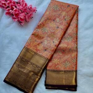Home coral peach semi kanjivaram pattu saree with golden zari floral motifs & purple border
